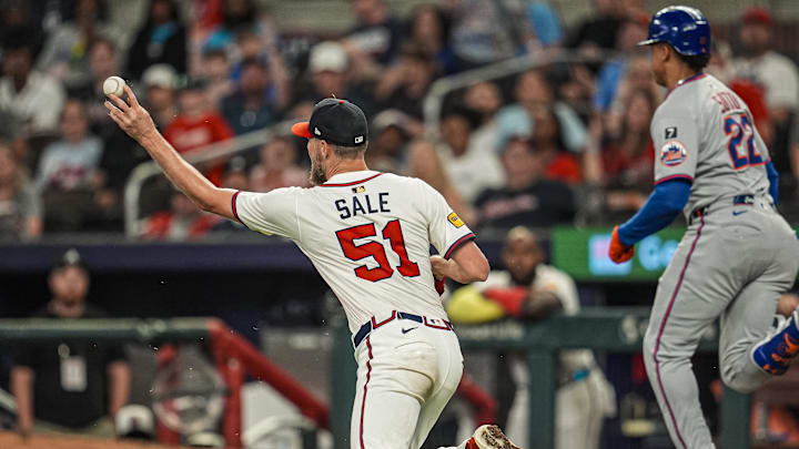 Jun 18, 2025; Cumberland, Georgia, USA; Atlanta Braves starting pitcher Chris Sale (51) throws out New York Mets right fielder Juan Soto (22) during the ninth inning at Truist Park. Mandatory Credit: Dale Zanine-Imagn Images