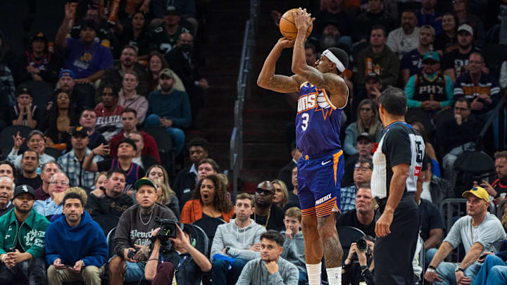 Nov 10, 2024; Phoenix, Arizona, USA; Phoenix Suns guard Bradley Beal (3) shoots from the corner during overtime during a game against the Sacramento Kings at Footprint Center. Mandatory Credit: Allan Henry-Imagn Images