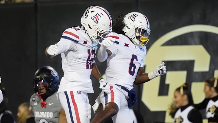 Nov 1, 2025; Boulder, Colorado, USA; Arizona Wildcats wide receiver Javin Whatley (6) celebrates his touchdown with wide receiver Tre Spivey (12) second quarter against the Colorado Buffaloes at Folsom Field. Mandatory Credit: Ron Chenoy-Imagn Images Nov 1, 2025; Boulder, Colorado, USA; Arizona Wildcats wide receiver Javin Whatley (6) celebrates his touchdown with wide receiver Tre Spivey (12) second quarter against the Colorado Buffaloes at Folsom Field. Mandatory Credit: Ron Chenoy-Imagn Images