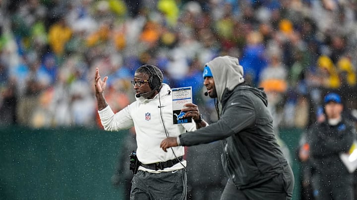 Detroit Lions defensive coordinator Aaron Glenn, left, and linebackers coach Kelvin Sheppard, right, react to a play against Green Bay Packers during the first half at Lambeau Field in Green Bay, Wis. on Sunday, Nov. 3, 2024.