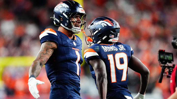Sep 29, 2025; Denver, Colorado, USA; Denver Broncos wide receiver Marvin Mims Jr. (19) celebrates with Denver Broncos tight end Evan Engram (1) after scoring a touchdown during the second quarter Cincinnati Bengals at Empower Field at Mile High. Sep 29, 2025; Denver, Colorado, USA; Denver Broncos wide receiver Marvin Mims Jr. (19) celebrates with Denver Broncos tight end Evan Engram (1) after scoring a touchdown during the second quarter Cincinnati Bengals at Empower Field at Mile High.