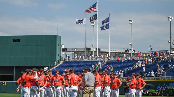 Jun 16, 2024; Omaha, NE, USA; The Virginia Cavaliers meet on the field after the loss against the Florida State Seminoles at Charles Schwab Field Omaha. Mandatory Credit: Steven Branscombe-Imagn Images Jun 16, 2024; Omaha, NE, USA; The Virginia Cavaliers meet on the field after the loss against the Florida State Seminoles at Charles Schwab Field Omaha. Mandatory Credit: Steven Branscombe-Imagn Images