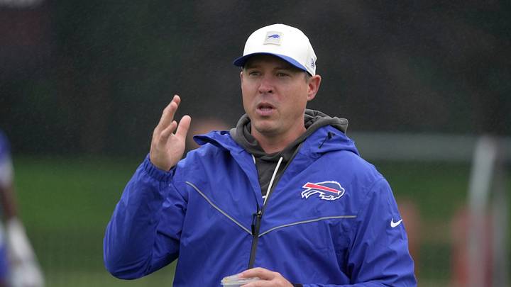Bills defense coordinator Jim Leonhard talks to someone on the sidelines before practice at Bills Training Camp at St. John Fisher University in Pittsford on Aug. 13 2026.
