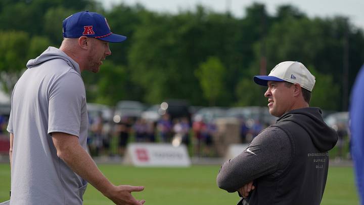 Bills head coach Joe Brady and defensive coordinator Jim Leonhard chat before practice at Bills Training Camp at St. John Fisher University in Pittsford on Aug. 1, 2026.