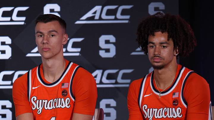 Oct 7, 2026; Charlotte, NC, USA; Syracuse Orange Gavin Doty and Aiden Tobiason listen in as their coach answers questions from the media during the ACC Tip-Off in Charlotte, NC. Mandatory Credit: Jim Dedmon-Imagn Images Oct 7, 2026; Charlotte, NC, USA; Syracuse Orange Gavin Doty and Aiden Tobiason listen in as their coach answers questions from the media during the ACC Tip-Off in Charlotte, NC. Mandatory Credit: Jim Dedmon-Imagn Images