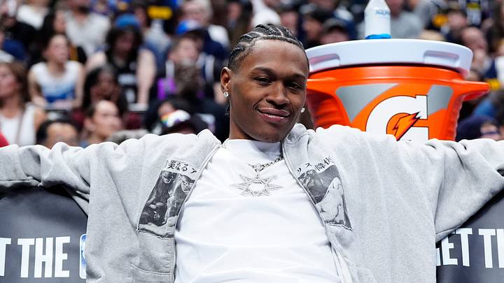 Mar 1, 2026; Denver, Colorado, USA; Denver Nuggets guard Peyton Watson (8) on the bench in the second quarter against the Minnesota Timberwolves at Ball Arena. Mandatory Credit: Ron Chenoy-Imagn Images
