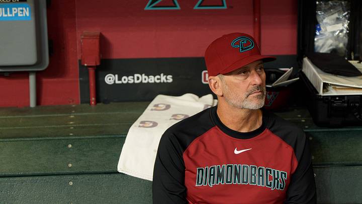 Aug 11, 2026; Phoenix, Arizona, USA; Arizona Diamondbacks manager Torey Lovullo looks on from the dugout before a game between the Colorado Rockies and the Arizona Diamondbacks at Chase Field. Mandatory Credit: Allan Henry-Imagn Images