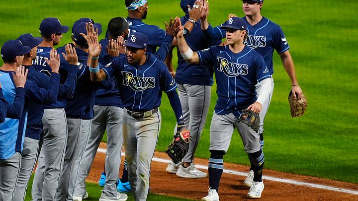 Aug 4, 2026; Denver, Colorado, USA; Members of the Tampa Bay Rays celebrate an eleventh inning win against the Colorado Rockies at Coors Field. Mandatory Credit: Ron Chenoy-Imagn Images Aug 4, 2026; Denver, Colorado, USA; Members of the Tampa Bay Rays celebrate an eleventh inning win against the Colorado Rockies at Coors Field. Mandatory Credit: Ron Chenoy-Imagn Images