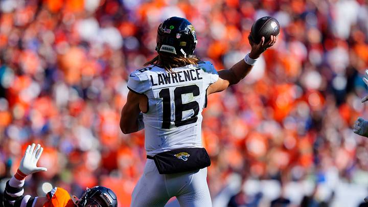 Sep 20, 2026; Denver, Colorado, USA; Jacksonville Jaguars quarterback Trevor Lawrence (16) throws downfield against the Denver Broncos at Empower Field at Mile High. Mandatory Credit: Ron Chenoy-Imagn Images Sep 20, 2026; Denver, Colorado, USA; Jacksonville Jaguars quarterback Trevor Lawrence (16) throws downfield against the Denver Broncos at Empower Field at Mile High. Mandatory Credit: Ron Chenoy-Imagn Images