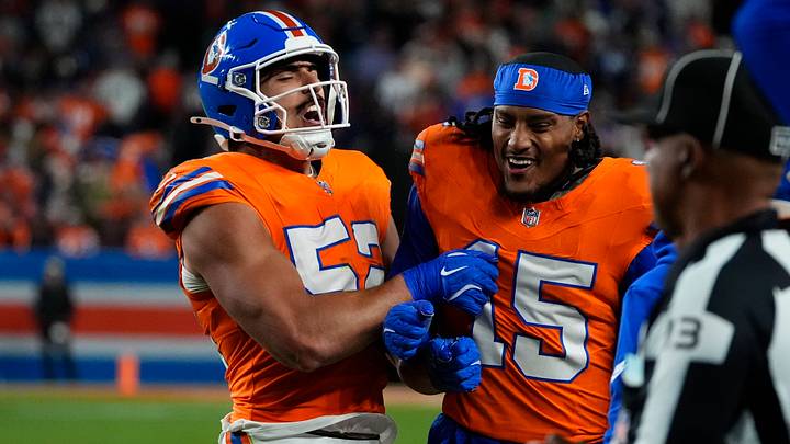 Oct 15, 2026; Denver, Colorado, USA; Denver Broncos linebacker Jonah Elliss (52) and linebacker Nik Bonitto (15) celebrate a sack in the third quarter against the Seattle Seahawks at Empower Field at Mile High. Oct 15, 2026; Denver, Colorado, USA; Denver Broncos linebacker Jonah Elliss (52) and linebacker Nik Bonitto (15) celebrate a sack in the third quarter against the Seattle Seahawks at Empower Field at Mile High.