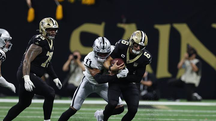 Sep 27, 2026; New Orleans, Louisiana, USA;  New Orleans Saints quarterback Tyler Shough (6) is sacked by Las Vegas Raiders safety Jeremy Chinn (11) in the second half at Caesars Superdome.  Mandatory Credit: Stephen Lew-Imagn Images