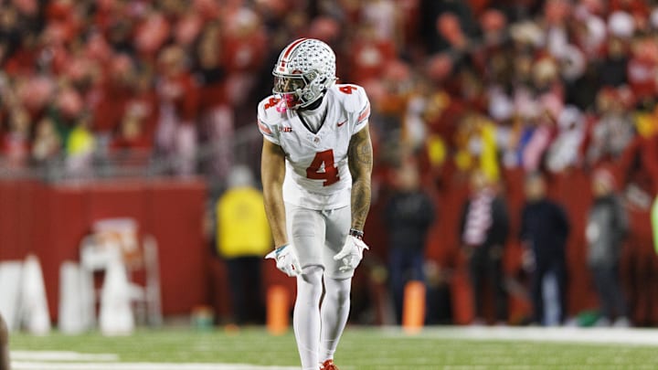 Oct 28, 2023; Madison, Wisconsin, USA;  Ohio State Buckeyes wide receiver Julian Fleming (4) during the game against the Wisconsin Badgers at Camp Randall Stadium. Mandatory Credit: Jeff Hanisch-Imagn Images