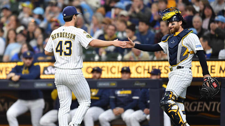 Apr 20, 2025; Milwaukee, Wisconsin, USA; Milwaukee Brewers starting pitcher Logan Henderson (43) celebrates with catcher Eric Haase (13) after ending the top of the first inning against the Athletics in his MLB debut at American Family Field. Mandatory Credit: Patrick Gorski-Imagn Images