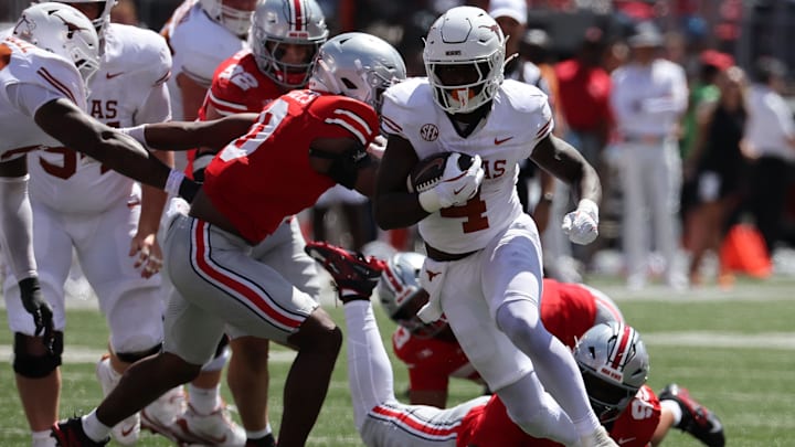 Texas Longhorns running back CJ Baxter rushes the ball against the Ohio State Buckeyes
