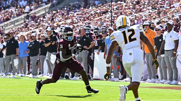 Oct 5, 2024; College Station, Texas, USA; Texas A&M Aggies running back Amari Daniels (5) runs the ball for a touchdown in the first quarter against the Missouri Tigers at Kyle Field. Mandatory Credit: Maria Lysaker-Imagn Images. Oct 5, 2024; College Station, Texas, USA; Texas A&M Aggies running back Amari Daniels (5) runs the ball for a touchdown in the first quarter against the Missouri Tigers at Kyle Field. Mandatory Credit: Maria Lysaker-Imagn Images.