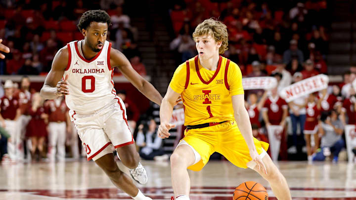 Iowa State guard Jackson Paveletzke (1) dribbles up court past Oklahoma guard Le'Tre Darthard (0) in