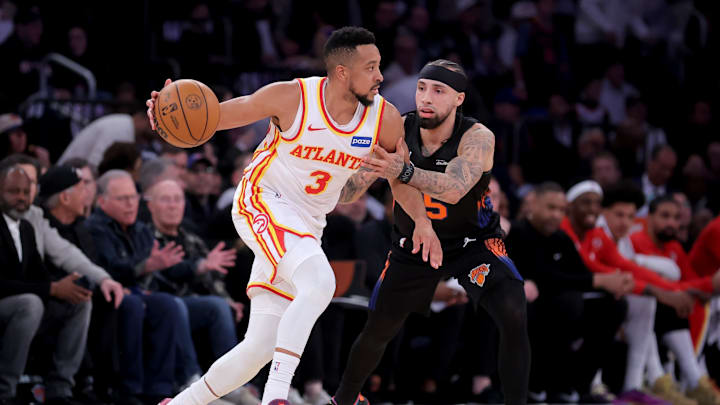Apr 28, 2026; New York, New York, USA; Atlanta Hawks guard CJ McCollum (3) controls the ball against New York Knicks guard Jose Alvarado (5) during the second quarter of game five of the first round of the 2026 NBA Playoffs at Madison Square Garden. Mandatory Credit: Brad Penner-Imagn Images