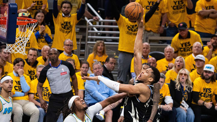 Apr 29, 2025; Indianapolis, Indiana, USA; Milwaukee Bucks forward Giannis Antetokounmpo (34) shoots the ball while  Indiana Pacers center Myles Turner (33) defends during game five of the first round for the 2024 NBA Playoffs at Gainbridge Fieldhouse. Mandatory Credit: Trevor Ruszkowski-Imagn Images