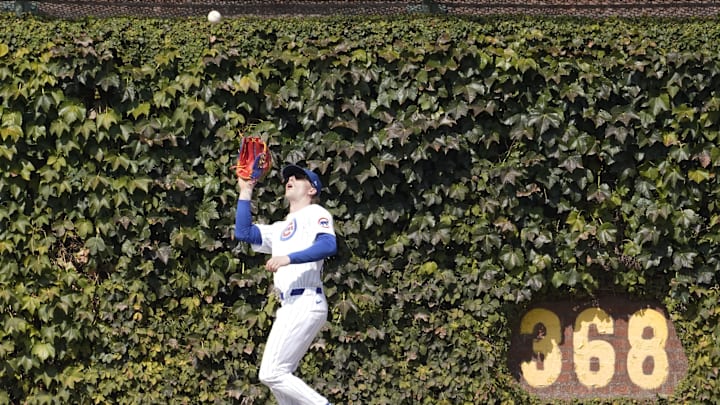 Sep 20, 2024; Chicago, Illinois, USA; Chicago Cubs outfielder Pete Crow-Armstrong (52) makes a catch on Washington Nationals catcher Drew Millas (not pictured) during the fourth inning at Wrigley Field. Sep 20, 2024; Chicago, Illinois, USA; Chicago Cubs outfielder Pete Crow-Armstrong (52) makes a catch on Washington Nationals catcher Drew Millas (not pictured) during the fourth inning at Wrigley Field.
