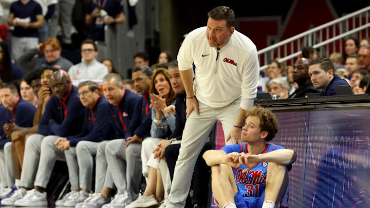 Feb 28, 2026; Auburn, Alabama, USA; Mississippi Rebels head coach Chris Beard talks with guard Zach Day (31) during the first half against the Auburn Tigers at Neville Arena. Mandatory Credit: John Reed-Imagn Images Feb 28, 2026; Auburn, Alabama, USA; Mississippi Rebels head coach Chris Beard talks with guard Zach Day (31) during the first half against the Auburn Tigers at Neville Arena. Mandatory Credit: John Reed-Imagn Images
