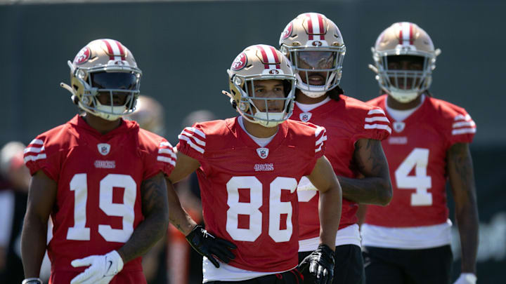 Jun 10, 2025; Santa Clara, CA, USA; San Francisco 49ers wide receivers Jacob Cowing (19), Junior Bergen (86), Malik Knowles (3) and Isaiah Neyor (14) queue up for a passing drill during an OTA at Levi's Stadium. Mandatory Credit: D. Ross Cameron-Imagn Images Jun 10, 2025; Santa Clara, CA, USA; San Francisco 49ers wide receivers Jacob Cowing (19), Junior Bergen (86), Malik Knowles (3) and Isaiah Neyor (14) queue up for a passing drill during an OTA at Levi's Stadium. Mandatory Credit: D. Ross Cameron-Imagn Images