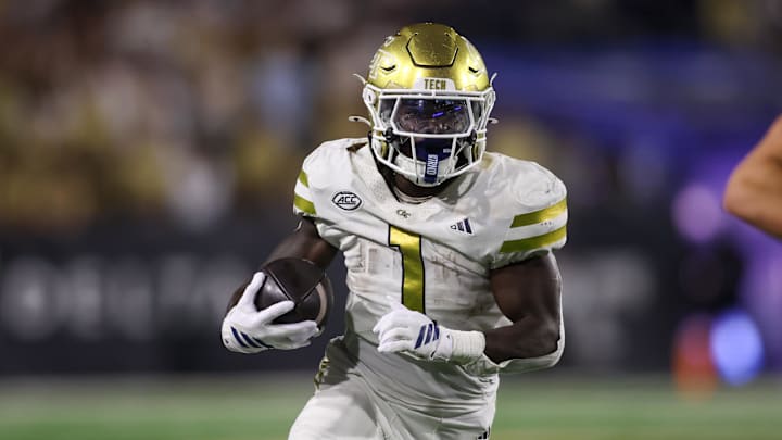 Nov 22, 2025; Atlanta, Georgia, USA; Georgia Tech Yellow Jackets running back Jamal Haynes (1) runs the ball against the Pittsburgh Panthers in the second quarter at Bobby Dodd Stadium at Hyundai Field. Mandatory Credit: Brett Davis-Imagn Images
