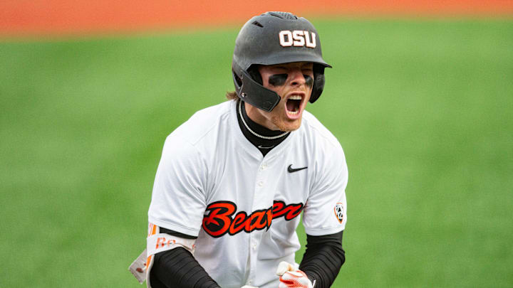 Oregon State's Travis Bazzana (37) celebrates after hitting the team's second solo home run during an NCAA college baseball game against Oregon at Goss Stadium on Friday, April 26, 2024, in Corvallis, Ore. Oregon State's Travis Bazzana (37) celebrates after hitting the team's second solo home run during an NCAA college baseball game against Oregon at Goss Stadium on Friday, April 26, 2024, in Corvallis, Ore.