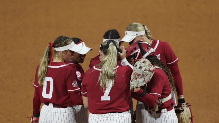 May 7, 2025; Athens, GA, USA; Alabama teammates meet on the mound during a game against South Carolina at Jack Turner Stadium. Mandatory Credit: Mady Mertens-Imagn Images