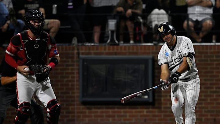 Vanderbilt's Jacob Humphrey (10) strikes out as Louisville catcher Matt Klein, left, reacts during the eighth inning of the Nashville Regional NCAA Baseball Tournament game at Hawkins Field Saturday, May 31, 2025, in Nashville, Tenn.