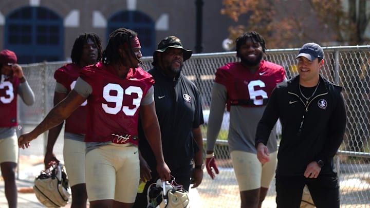 FSU football players walk into the first spring practice of the spring season on Wednesday, March 19, 2025
