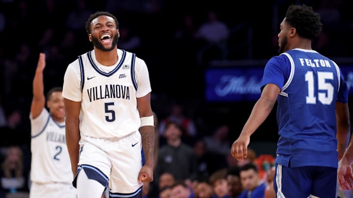 Mar 12, 2025; New York, NY, USA; Villanova Wildcats guard Wooga Poplar (5) reacts after Seton Hall Pirates guard Jahseem Felton (15) loses the ball out of bounds during the second half at Madison Square Garden. Mandatory Credit: Brad Penner-Imagn Images