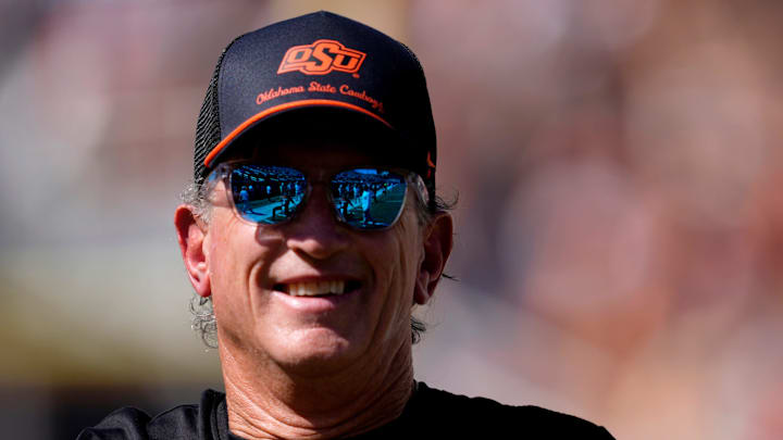 Oklahoma State Interim Head Coach/Offensive Coordinator Doug Meacham talks to players before the college football game between the Oklahoma State Cowboys and the Baylor Bears at Boone Pickens Stadium in Stillwater, Okla., Saturday, Sept. 27, 2025.