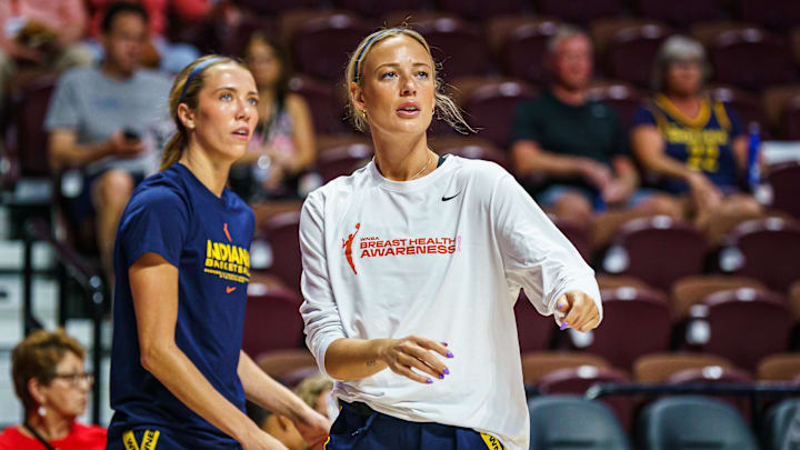 Aug 17, 2025; Uncasville, Connecticut, USA; Indiana Fever guard Sophie Cunningham (8) and Indiana Fever guard Lexie Hull (10) warm up before the start of the game against the Connecticut Sun at Mohegan Sun Arena. Mandatory Credit: David Butler II-Imagn Images