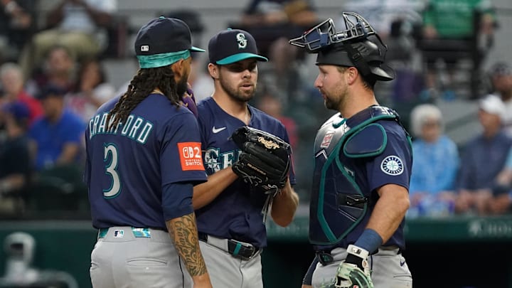 Seattle Mariners pitcher Matt Brash (47) is visited on the mound by. shortstop J.P. Crawford (3) and catcher Cal Raleigh (29) during the seventh inning against the Texas Rangers at Globe Life Field on May 3. Seattle Mariners pitcher Matt Brash (47) is visited on the mound by. shortstop J.P. Crawford (3) and catcher Cal Raleigh (29) during the seventh inning against the Texas Rangers at Globe Life Field on May 3.