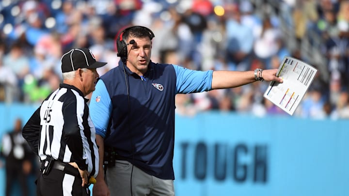 Dec 24, 2023; Nashville, Tennessee, USA; Tennessee Titans head coach Mike Vrabel talks with line judge Jeff Seeman (45) during the first half against the Seattle Seahawks at Nissan Stadium. Mandatory Credit: Christopher Hanewinckel-Imagn Images