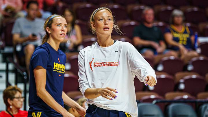 Aug 17, 2025; Uncasville, Connecticut, USA; Indiana Fever guard Sophie Cunningham (8) and Indiana Fever guard Lexie Hull (10) warm up before the start of the game against the Connecticut Sun at Mohegan Sun Arena. Mandatory Credit: David Butler II-Imagn Images