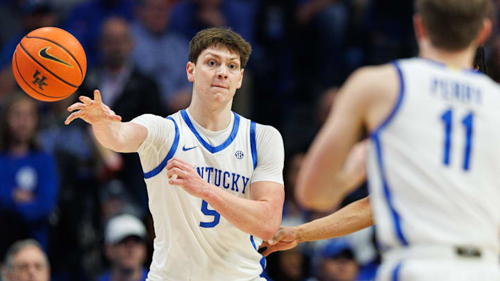 Mar 4, 2025; Lexington, Kentucky, USA; Kentucky Wildcats forward Trent Noah (9) passes the ball to guard Travis Perry (11) during the first half against the LSU Tigers at Rupp Arena at Central Bank Center. Mandatory Credit: Jordan Prather-Imagn Images