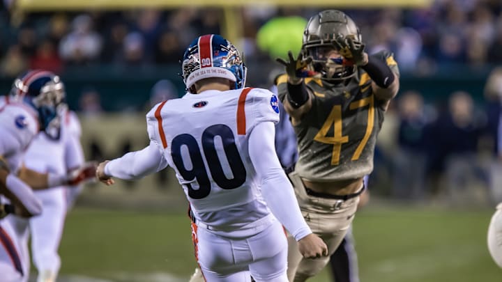 Then-freshman defensive back Noah Short blocks a punt in the 2022 Army-Navy Game. Then-freshman defensive back Noah Short blocks a punt in the 2022 Army-Navy Game.