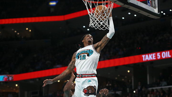 Nov 6, 2024; Memphis, Tennessee, USA; Memphis Grizzlies guard Ja Morant (12) drives to the basket during the second half against the Los Angeles Lakers at FedExForum. Mandatory Credit: Petre Thomas-Imagn Images