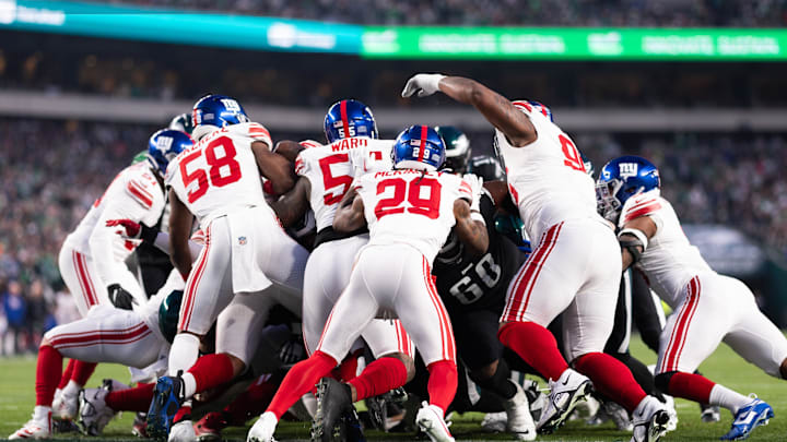 Dec 25, 2023; Philadelphia, Pennsylvania, USA; Philadelphia Eagles quarterback Jalen Hurts (1) scores a touchdown on a sneak play against the New York Giants. Dec 25, 2023; Philadelphia, Pennsylvania, USA; Philadelphia Eagles quarterback Jalen Hurts (1) scores a touchdown on a sneak play against the New York Giants.