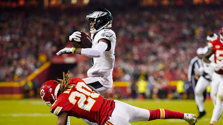 Nov 20, 2023; Kansas City, Missouri, USA; Philadelphia Eagles wide receiver DeVonta Smith (6) is tackled by Kansas City Chiefs safety Justin Reid (20) during the second half at GEHA Field at Arrowhead Stadium. Mandatory Credit: Jay Biggerstaff-Imagn Images