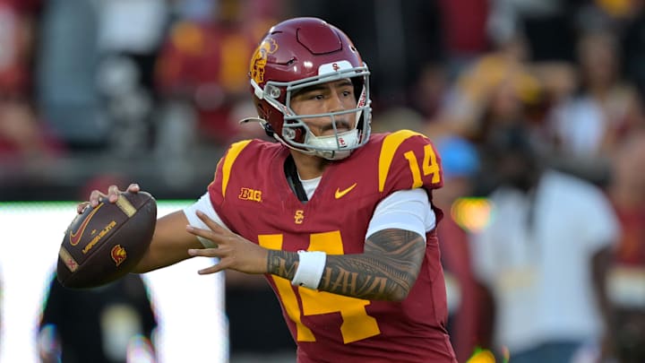 Oct 11, 2025; Los Angeles, California, USA;  USC Trojans quarterback Jayden Maiava (14) throws a pass in the first half against the Michigan Wolverines at United Airlines Field at the Los Angeles Memorial Coliseum. Mandatory Credit: Jayne Kamin-Oncea-Imagn Images