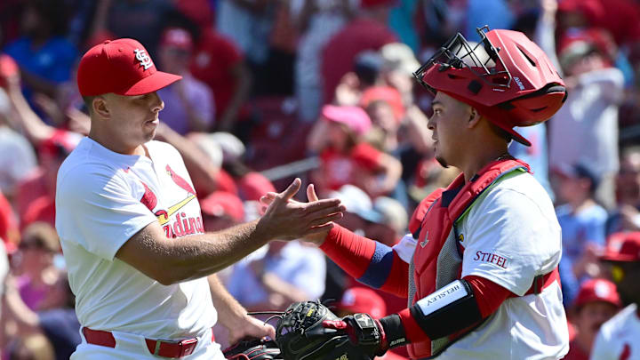 Apr 16, 2025; St. Louis, MO, USA; St. Louis Cardinals pitcher Ryan Helsley (56, left) is congratulated by St. Louis Cardinals catcher Yohel Pozo (63) after the Cardinals defeated the Houston Astros 4-1 at Busch Stadium. Mandatory Credit: Tim Vizer-Imagn Images Apr 16, 2025; St. Louis, MO, USA; St. Louis Cardinals pitcher Ryan Helsley (56, left) is congratulated by St. Louis Cardinals catcher Yohel Pozo (63) after the Cardinals defeated the Houston Astros 4-1 at Busch Stadium. Mandatory Credit: Tim Vizer-Imagn Images