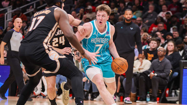 Feb 7, 2026; Atlanta, Georgia, USA; Charlotte Hornets guard Kon Knueppel (7) drives to the basket against the Atlanta Hawks in the fourth quarter at State Farm Arena. Mandatory Credit: Brett Davis-Imagn Images