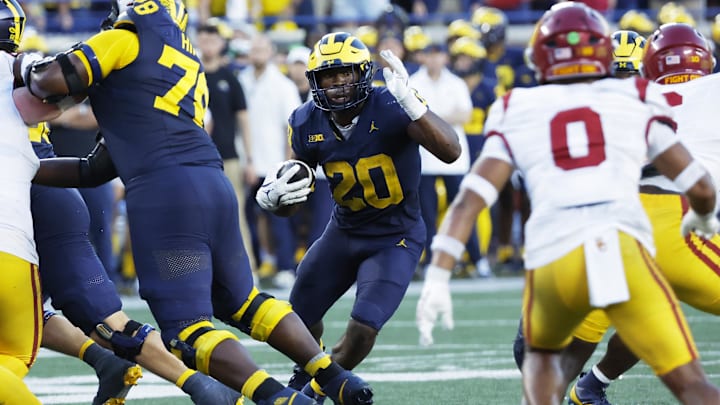 Sep 21, 2024; Ann Arbor, Michigan, USA; Michigan Wolverines running back Kalel Mullings (20) rushes in the second half against the USC Trojans at Michigan Stadium. Mandatory Credit: Rick Osentoski-Imagn Images Sep 21, 2024; Ann Arbor, Michigan, USA; Michigan Wolverines running back Kalel Mullings (20) rushes in the second half against the USC Trojans at Michigan Stadium. Mandatory Credit: Rick Osentoski-Imagn Images