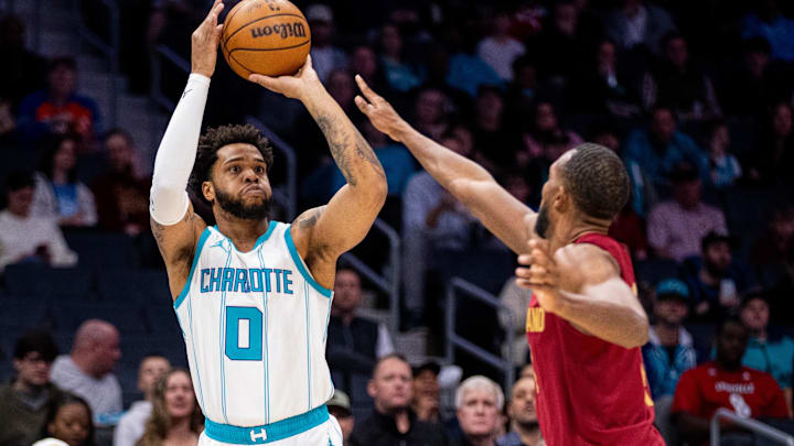 Mar 7, 2025; Charlotte, North Carolina, USA; Charlotte Hornets forward Miles Bridges (0) shoots against the Cleveland Cavaliers during the first quarter at Spectrum Center. Mandatory Credit: Scott Kinser-Imagn Images