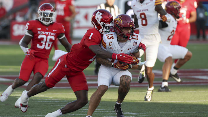 Houston Cougars defensive back Latrell McCutchin Sr. (1) attempts to tackle Iowa State Cyclones wide receiver Jaylin Noel (13) during the first quarter at TDECU Stadium.