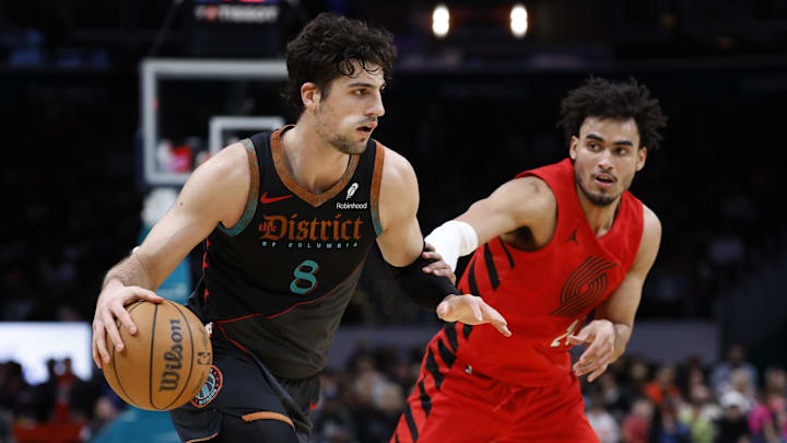 Apr 5, 2024; Washington, District of Columbia, USA; Washington Wizards forward Deni Avdija (8) drives to the basket as Portland Trail Blazers forward Justin Minaya (24) defends in the second half at Capital One Arena. Apr 5, 2024; Washington, District of Columbia, USA; Washington Wizards forward Deni Avdija (8) drives to the basket as Portland Trail Blazers forward Justin Minaya (24) defends in the second half at Capital One Arena.