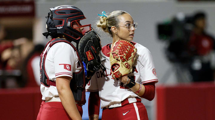 Oklahoma catcher Isabela Emerling, left, and pitcher Sam Landry, right, talk during an NCAA softball game between the Oklahoma Sooners (OU) and the Tennessee Lady Volunteers at Love's Field in Norman, Okla., Friday, March 28, 2025. Oklahoma catcher Isabela Emerling, left, and pitcher Sam Landry, right, talk during an NCAA softball game between the Oklahoma Sooners (OU) and the Tennessee Lady Volunteers at Love's Field in Norman, Okla., Friday, March 28, 2025.