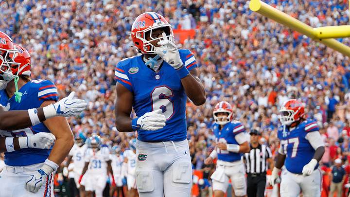 Sep 26, 2026; Gainesville, Florida, USA; Florida Gators wide receiver Dallas Wilson (6) gestures after scoring a touchdown against the Mississippi Rebels during the second half at Ben Hill Griffin Stadium. Mandatory Credit: Matt Pendleton-Imagn Images Sep 26, 2026; Gainesville, Florida, USA; Florida Gators wide receiver Dallas Wilson (6) gestures after scoring a touchdown against the Mississippi Rebels during the second half at Ben Hill Griffin Stadium. Mandatory Credit: Matt Pendleton-Imagn Images